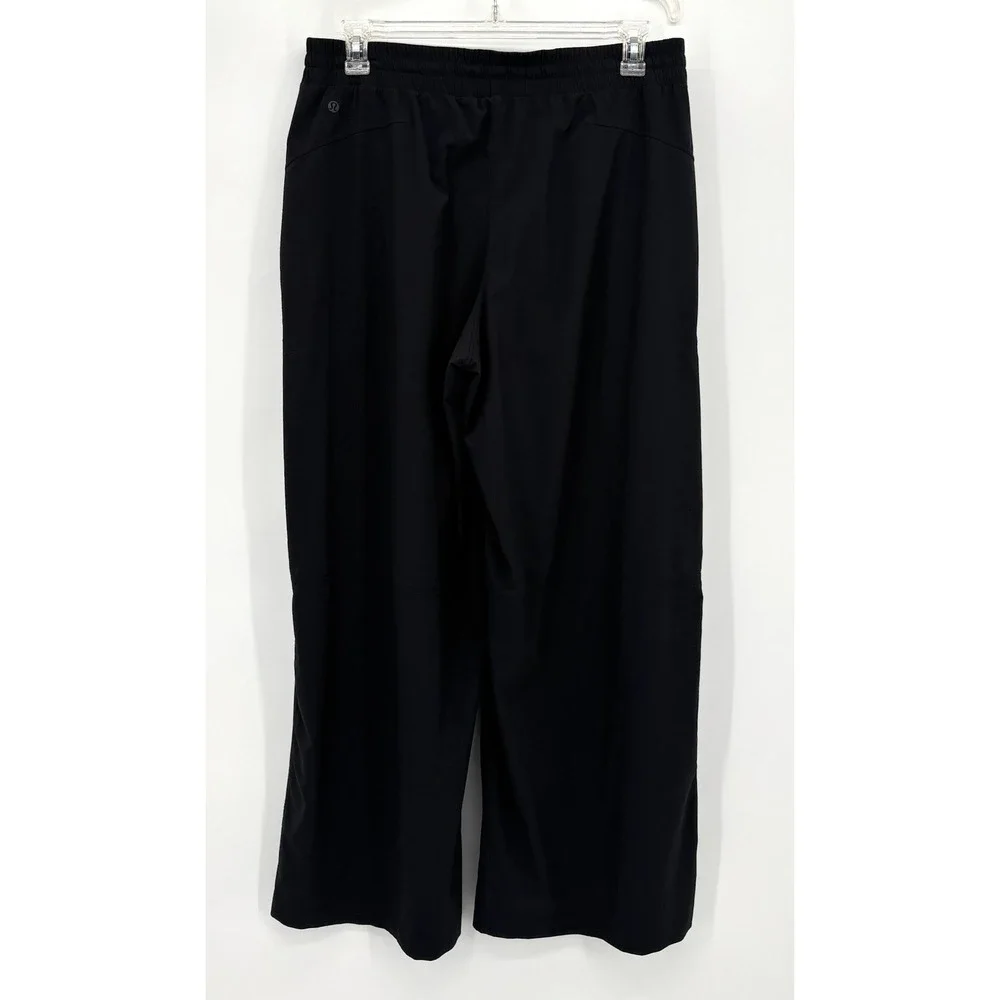 Lululemon Wide Leg Luxtreme Woven Travel Pants 14 Black Elastic Waist‎ Pockets